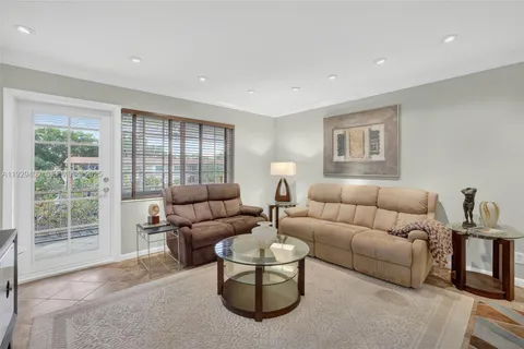 a view of a balcony with furniture