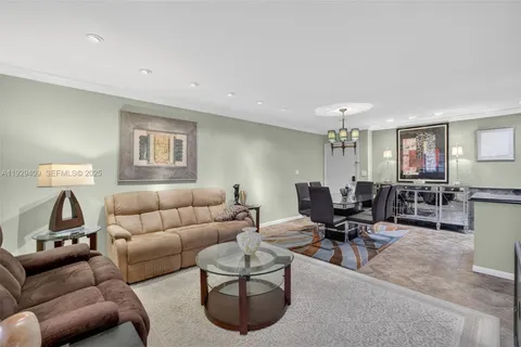 a view of a porch with a table and chair