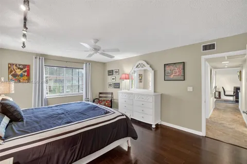a view of a house with a yard and plants