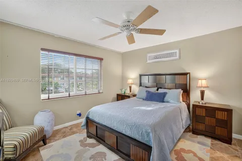 a view of a swimming pool with a seating space