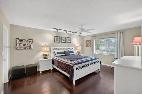 a bed room with a bed and a window