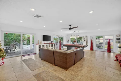 an aerial view of residential houses with city view