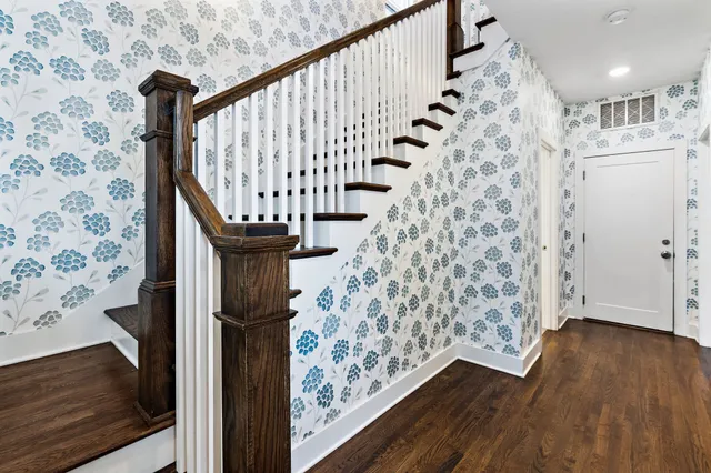 a view of entryway with wooden floor
