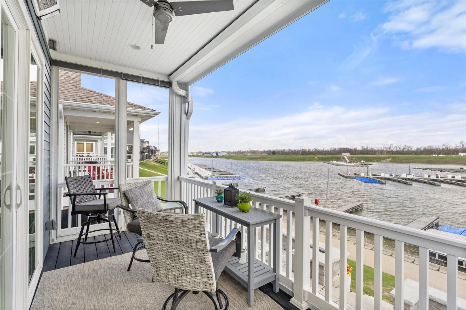 224 Leeward Way Ottawa, IL 61350 - Photo 27 of 58 a view of a balcony with furniture and wooden floor