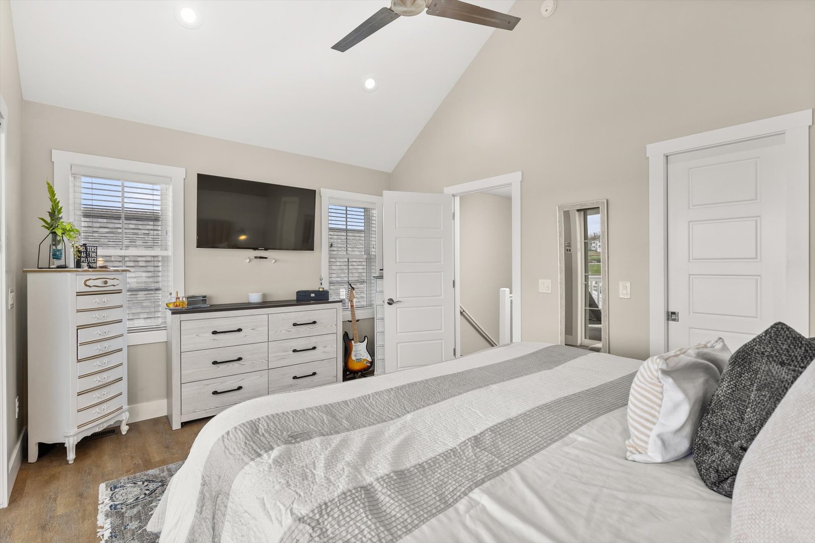 224 Leeward Way Ottawa, IL 61350 - Photo 36 of 58 a bedroom with a bed and a flat screen tv