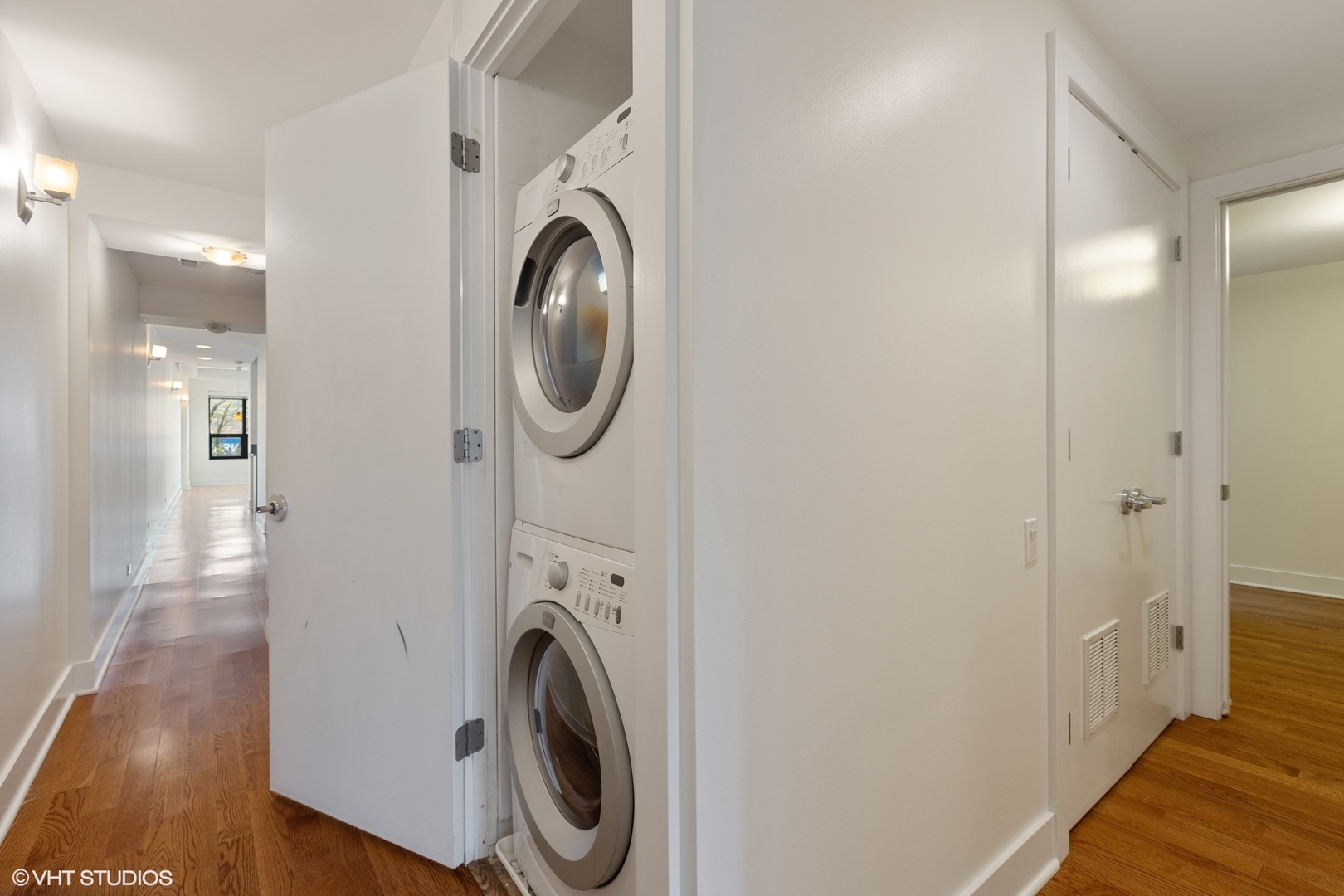 3310 North Halsted Street, Unit 2 Chicago, IL 60657 - Photo 18 of 22 a view of a hallway with washer and dryer