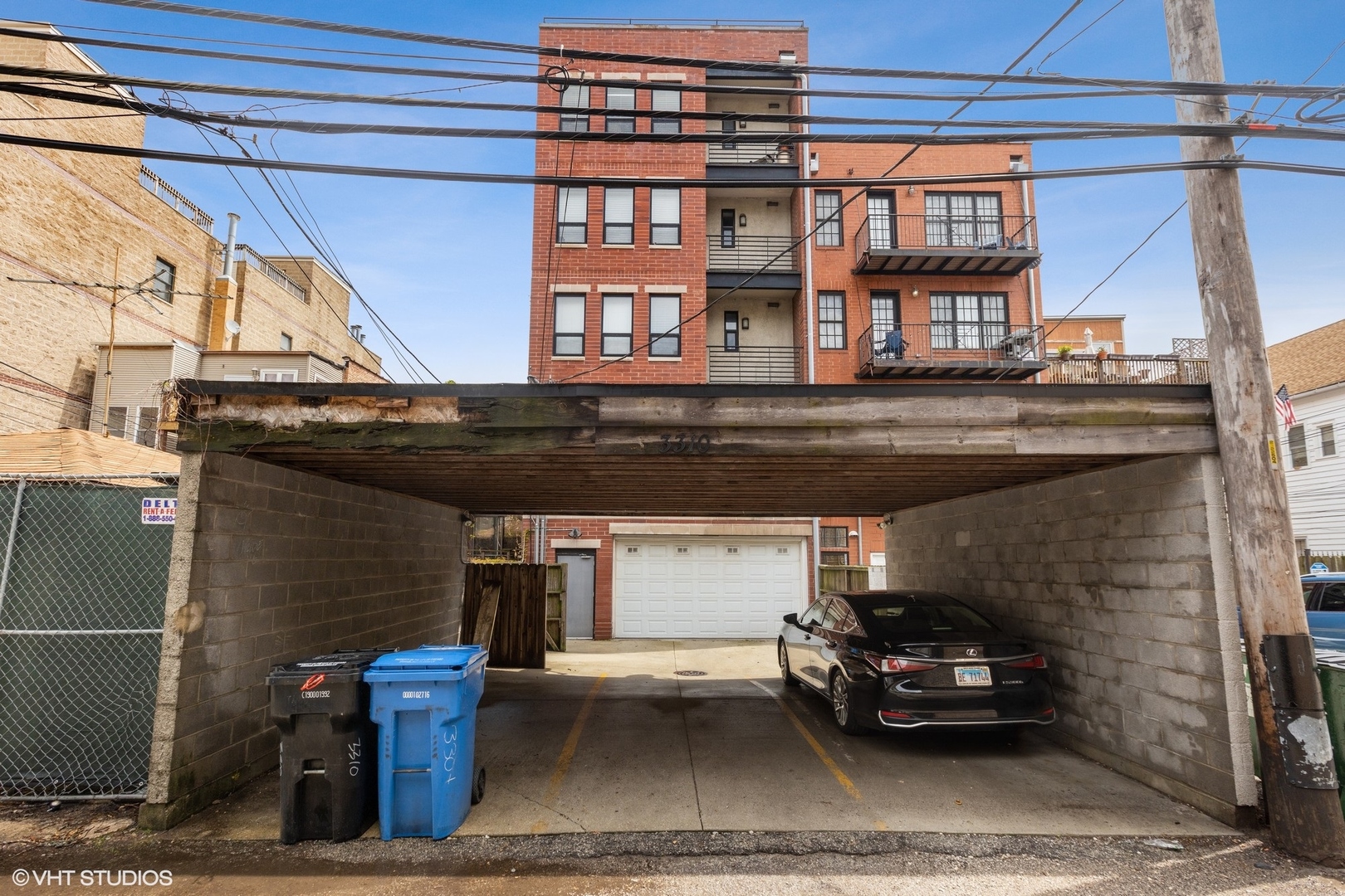 3310 North Halsted Street, Unit 2 Chicago, IL 60657 - Photo 21 of 22 a car parked in front of a building