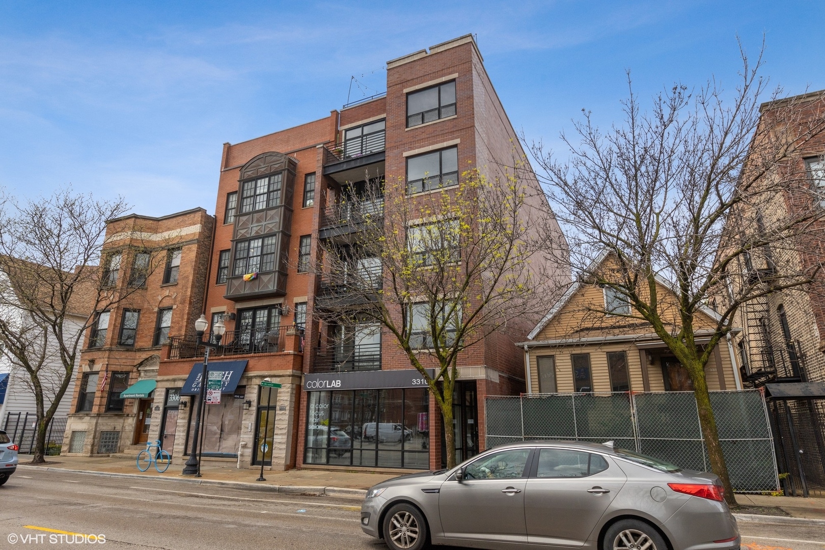 3310 North Halsted Street, Unit 2 Chicago, IL 60657 - Photo 22 of 22 a front view of a building with parking space