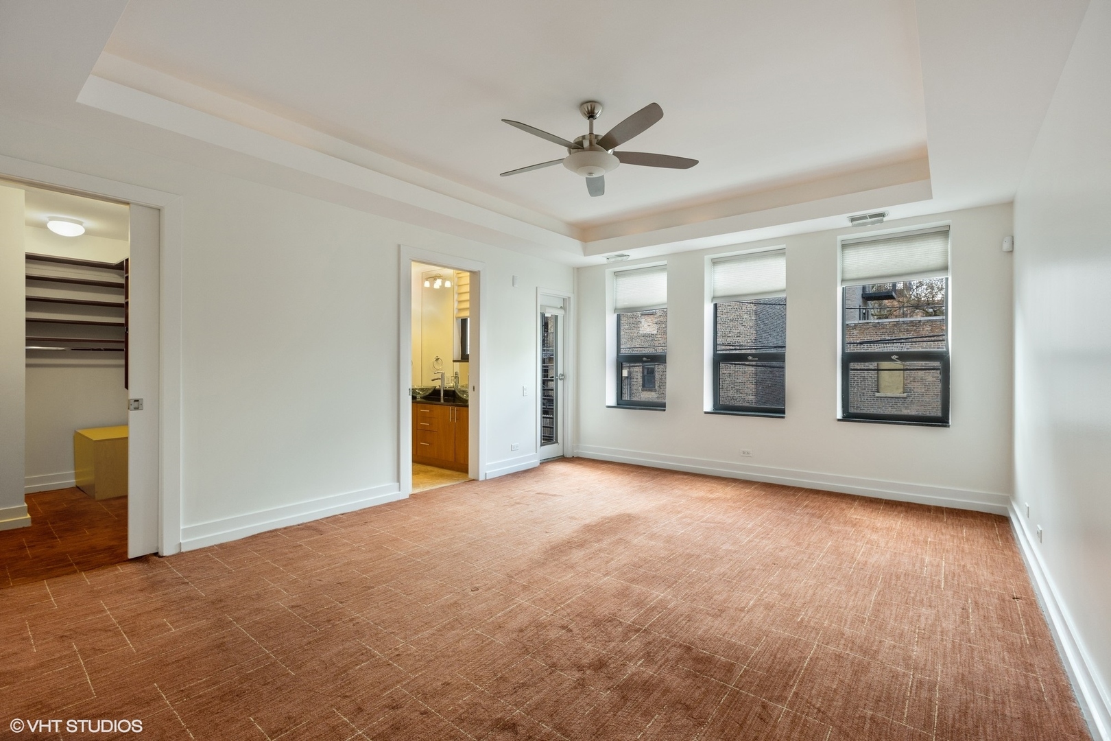 3310 North Halsted Street, Unit 2 Chicago, IL 60657 - Photo 10 of 22 a view of a livingroom with a ceiling fan and window