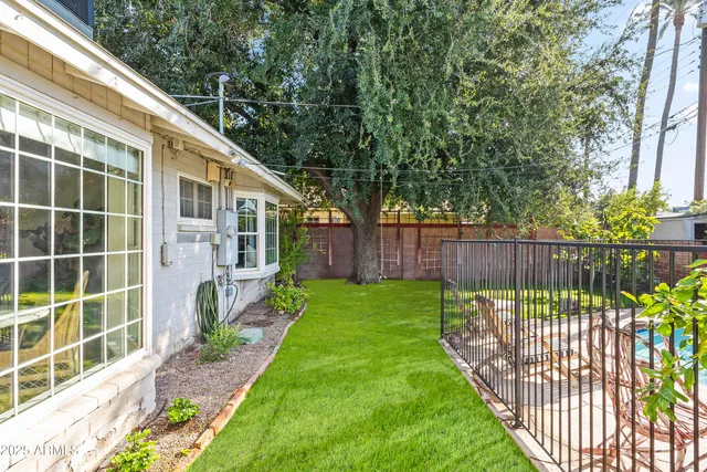 a view of a backyard with a garden