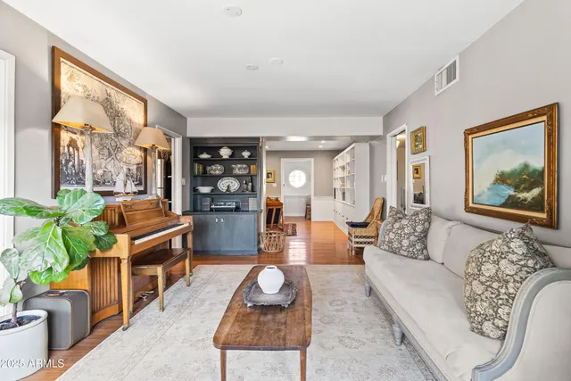 a living room with furniture and a couch