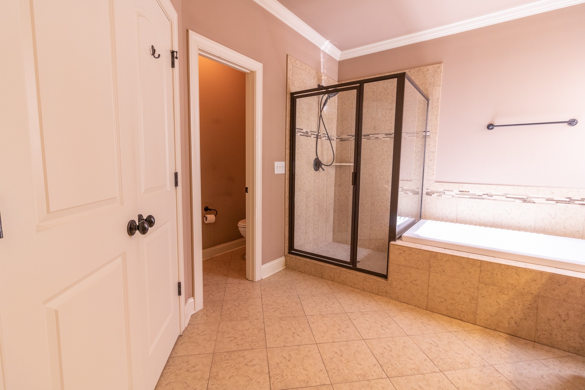 3075 Sakari Circle Spring Hill, TN 37174 - Photo 14 of 35 a bathroom with a bathtub and a shower