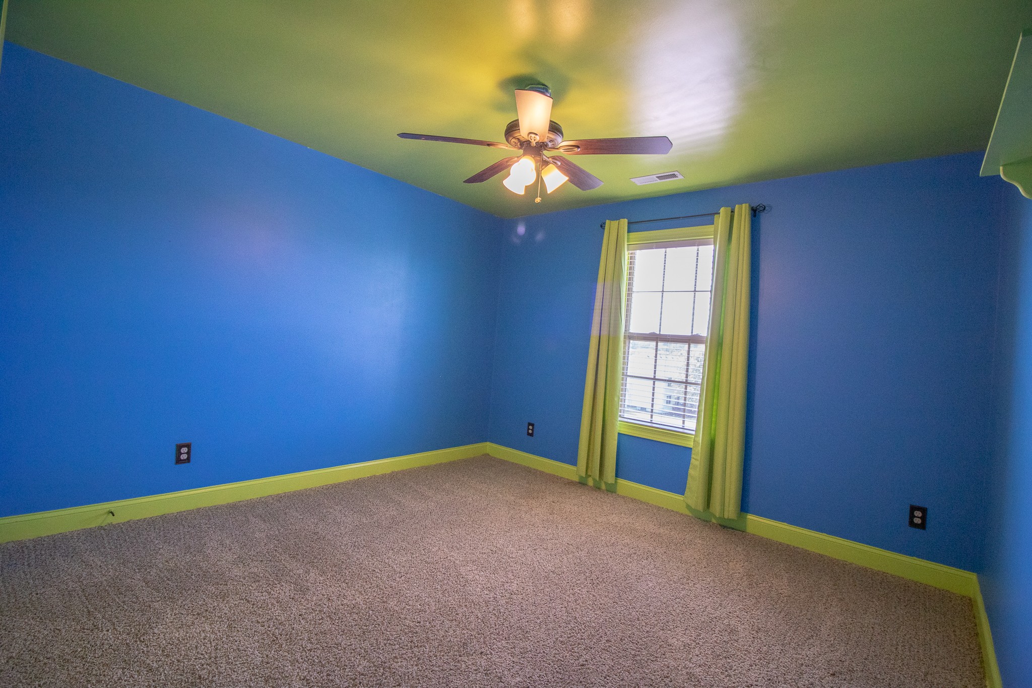 3075 Sakari Circle Spring Hill, TN 37174 - Photo 22 of 35 an empty room with windows and fan