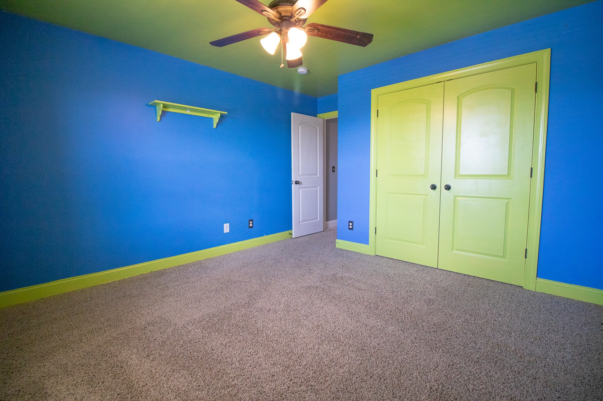 3075 Sakari Circle Spring Hill, TN 37174 - Photo 23 of 35 an empty room with closet and a chandelier fan