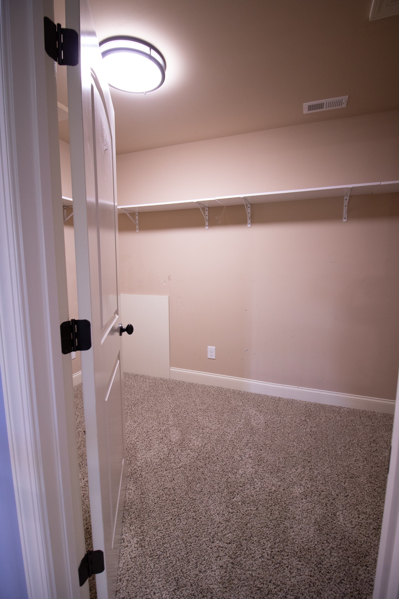3075 Sakari Circle Spring Hill, TN 37174 - Photo 30 of 35 a view of a room with wooden floor and window