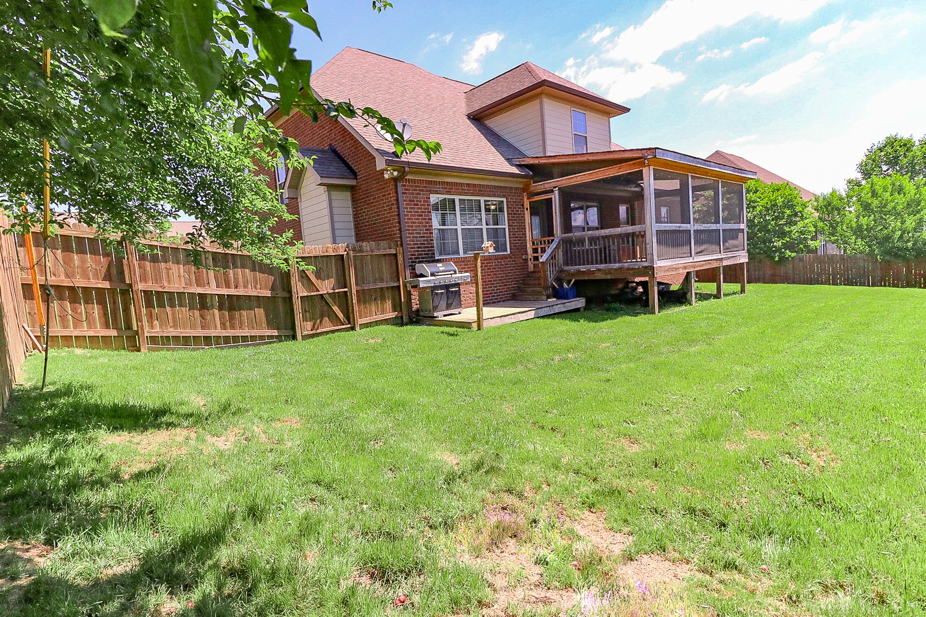 3075 Sakari Circle Spring Hill, TN 37174 - Photo 34 of 35 a view of a house with a backyard porch and sitting area