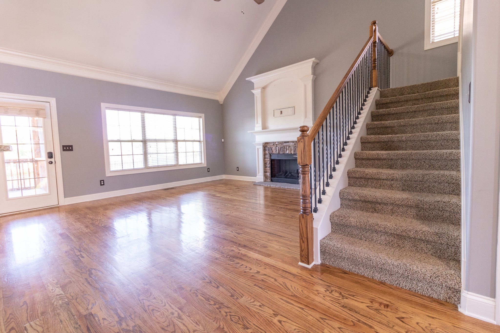 3075 Sakari Circle Spring Hill, TN 37174 - Photo 4 of 35 a view of an entryway with wooden floor and stairs