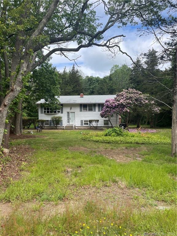 a house view with a garden space