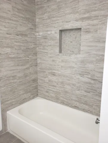 a bathroom with a bathtub