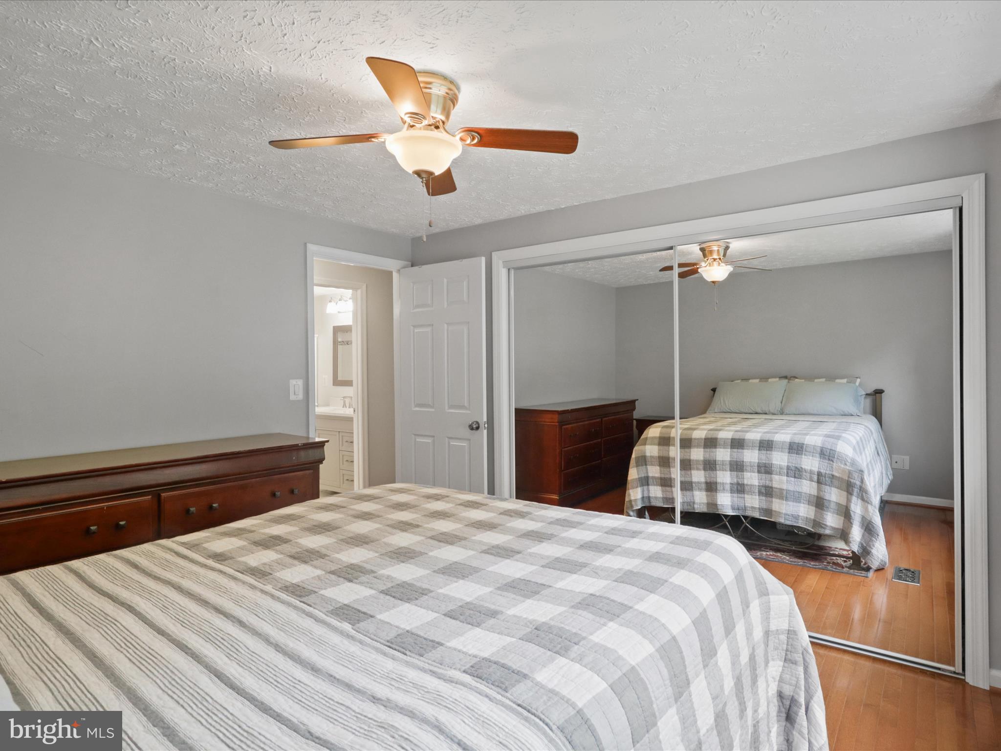 7313 Husky Lane Springfield, VA 22151 - Photo 20 of 49 a bedroom with bed and window