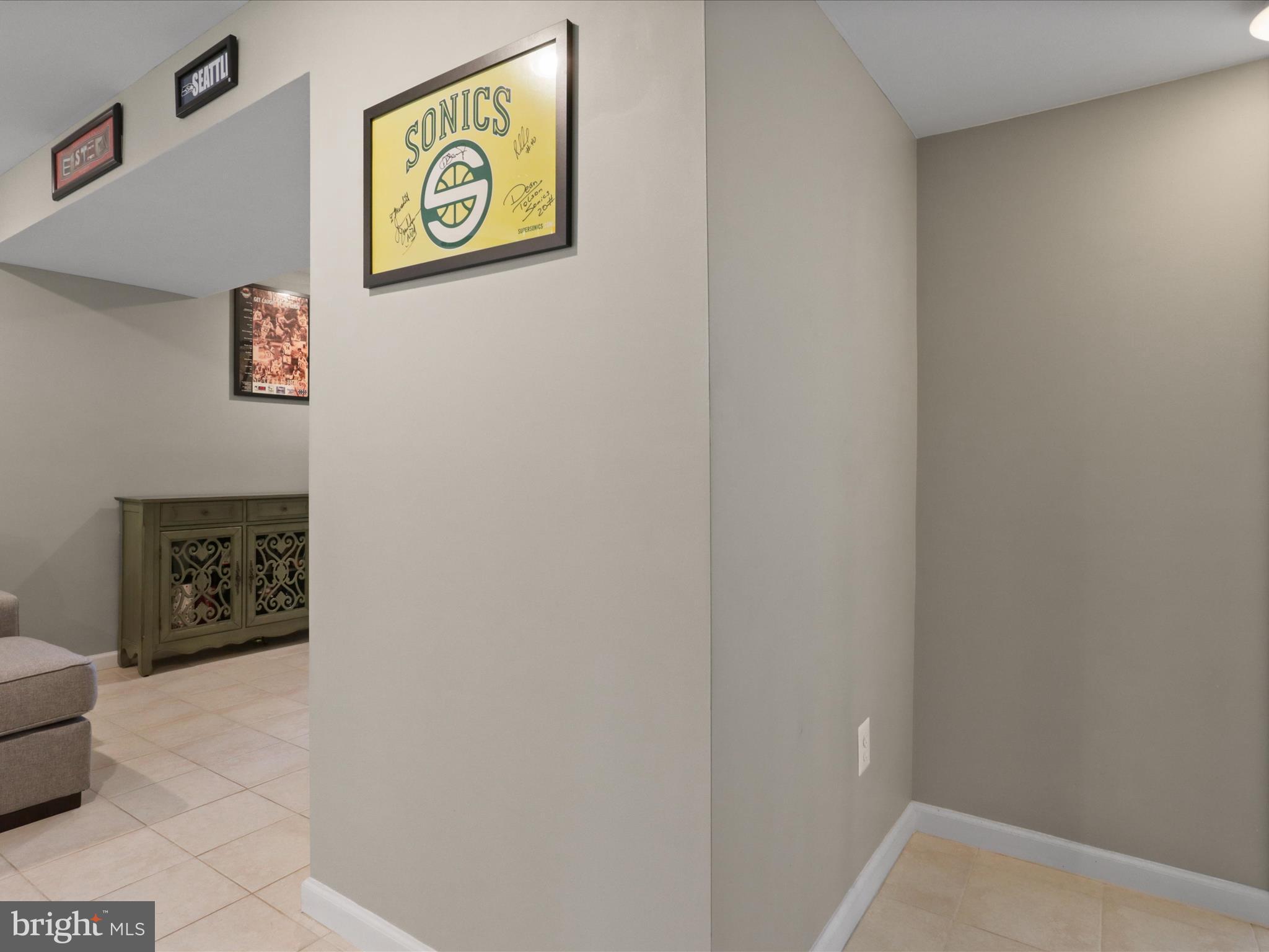 7313 Husky Lane Springfield, VA 22151 - Photo 26 of 49 a wall painting with a potted plant