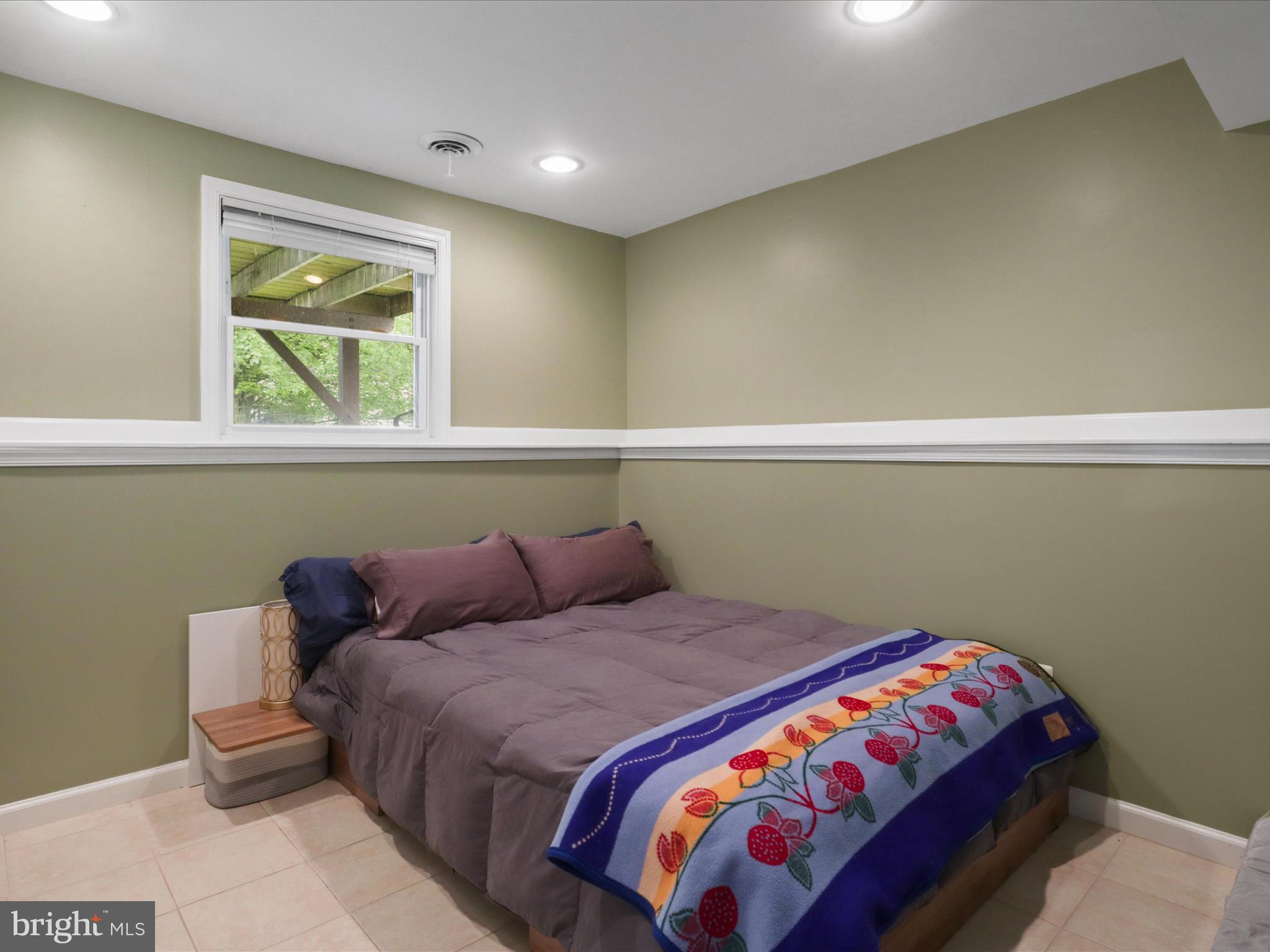 7313 Husky Lane Springfield, VA 22151 - Photo 30 of 49 a bedroom with a bed and window