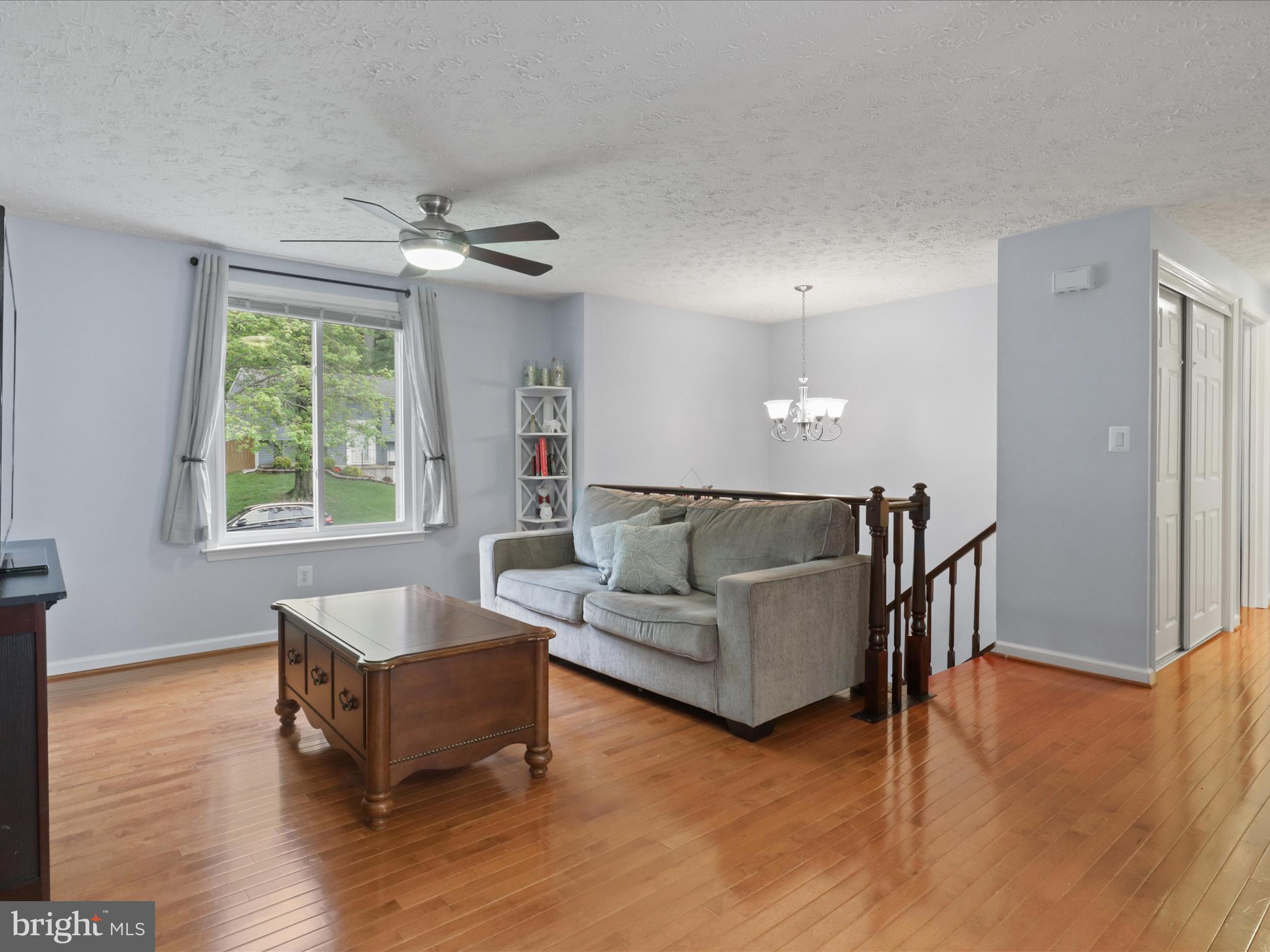 7313 Husky Lane Springfield, VA 22151 - Photo 6 of 49 a living room with furniture and a window
