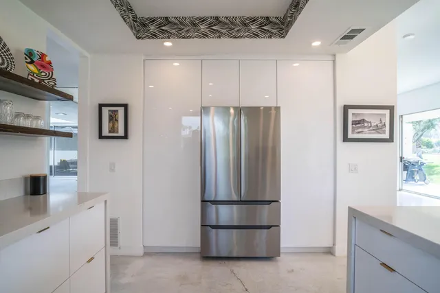a bathroom with a sink toilet and shower curtain