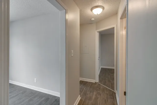 a bathroom with a toilet a sink and bathtub