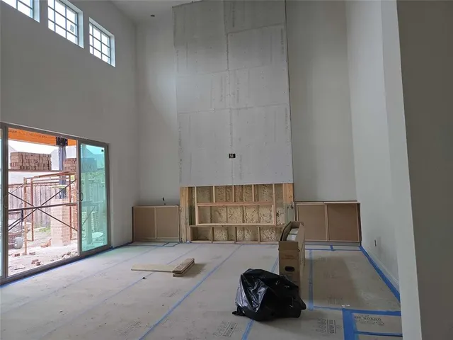 a bathroom with a tub and a sink