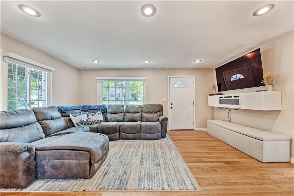1248 Savannah Road New Castle, PA 16101 - Photo 11 of 25 a living room with furniture and a flat screen tv