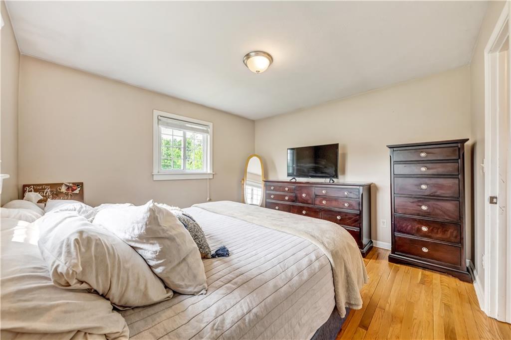 1248 Savannah Road New Castle, PA 16101 - Photo 15 of 25 a bedroom with a bed and a tv