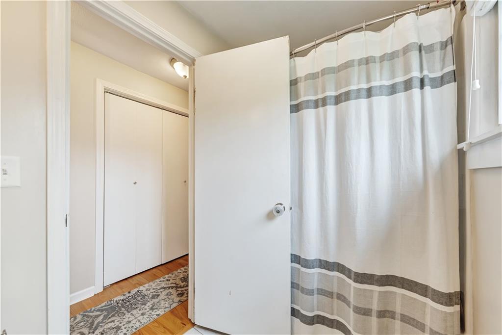 1248 Savannah Road New Castle, PA 16101 - Photo 16 of 25 a bathroom with a shower and a sink