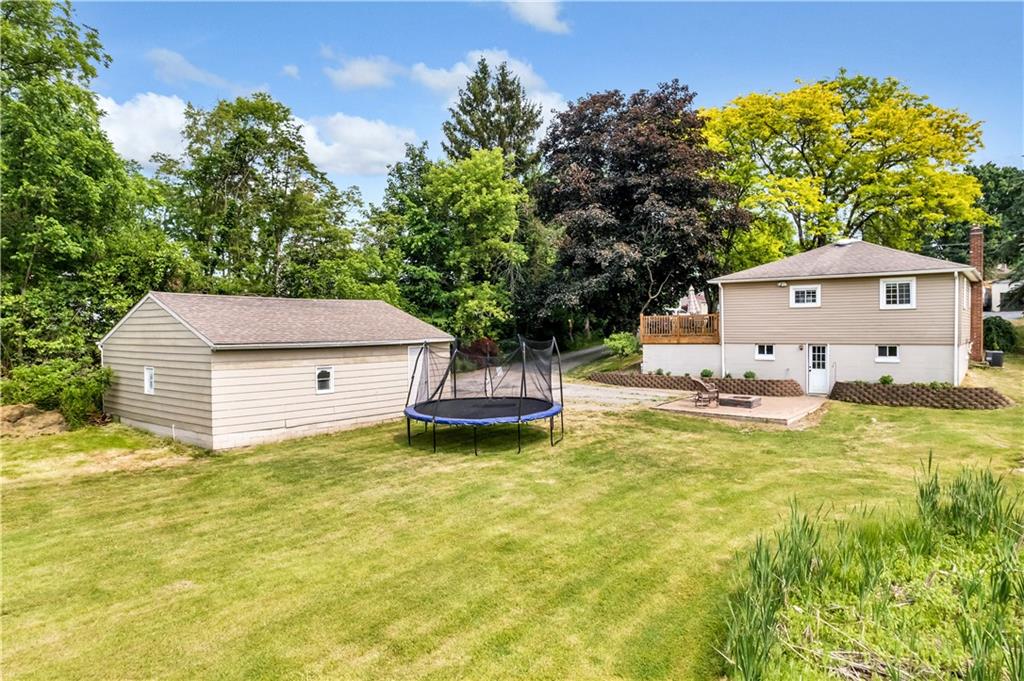 1248 Savannah Road New Castle, PA 16101 - Photo 20 of 25 a view of a house with pool and a yard