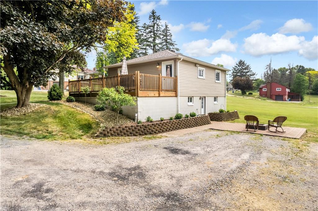 1248 Savannah Road New Castle, PA 16101 - Photo 23 of 25 a view of a house with backyard and trees
