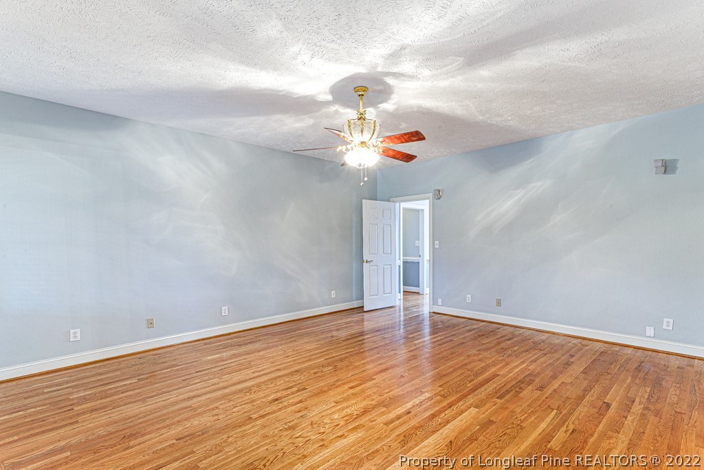 4051 Mt Tabor Road Red Springs, NC 28377 - Photo 20 of 50 a room with wooden floor and window