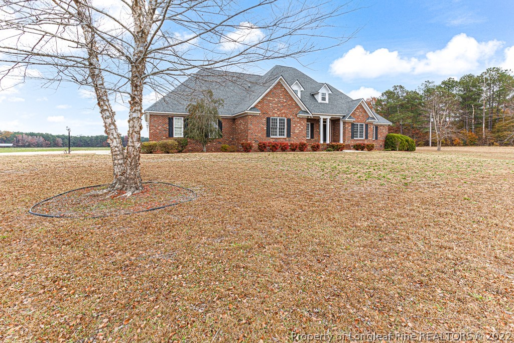 4051 Mt Tabor Road Red Springs, NC 28377 - Photo 2 of 50 a front view of a house with a yard