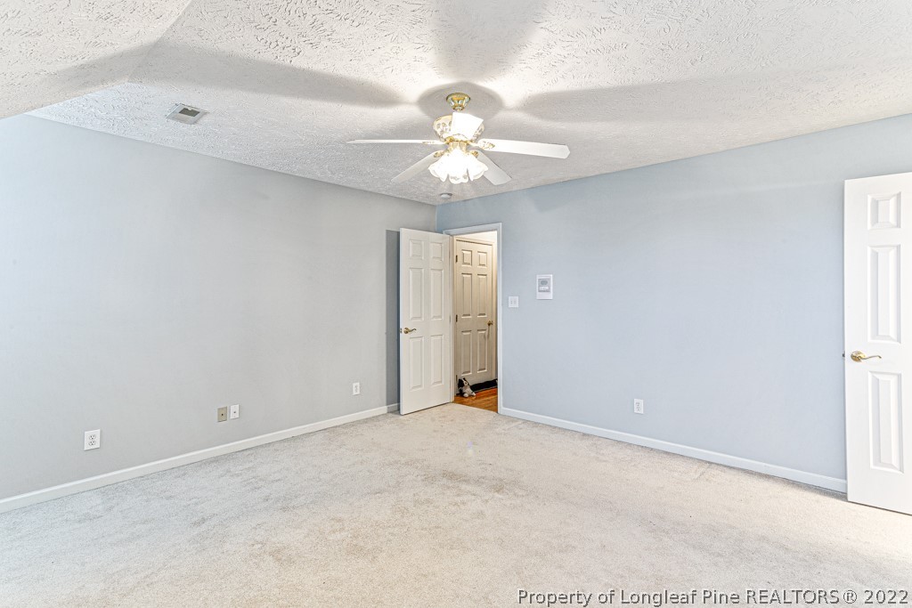 4051 Mt Tabor Road Red Springs, NC 28377 - Photo 37 of 50 a view of an empty room with a window