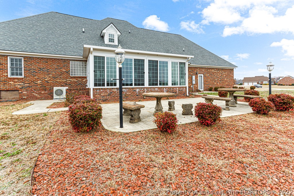 4051 Mt Tabor Road Red Springs, NC 28377 - Photo 42 of 50 a view of a house with backyard and sitting area