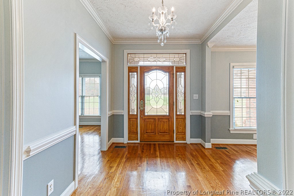 4051 Mt Tabor Road Red Springs, NC 28377 - Photo 6 of 50 wooden floor in an empty room with a window