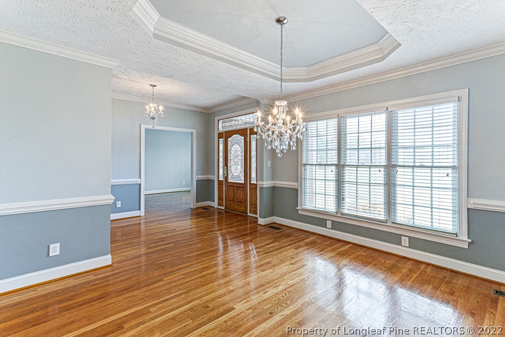 4051 Mt Tabor Road Red Springs, NC 28377 - Photo 8 of 50 a view of an empty room with a window and wooden floor