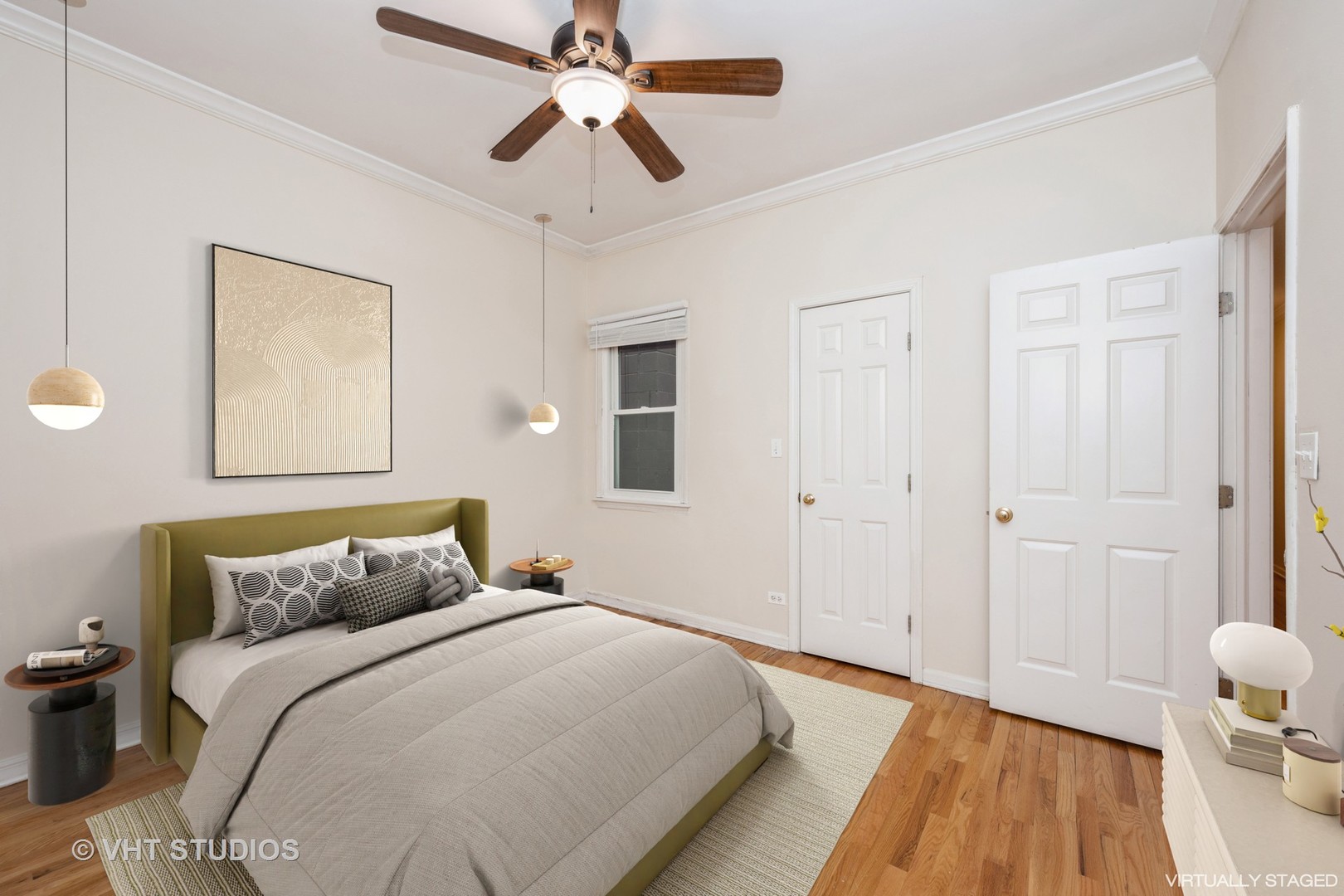 2632 North Halsted Street, Unit 3 Chicago, IL 60614 - Photo 6 of 14 a bedroom with a bed and wooden floor