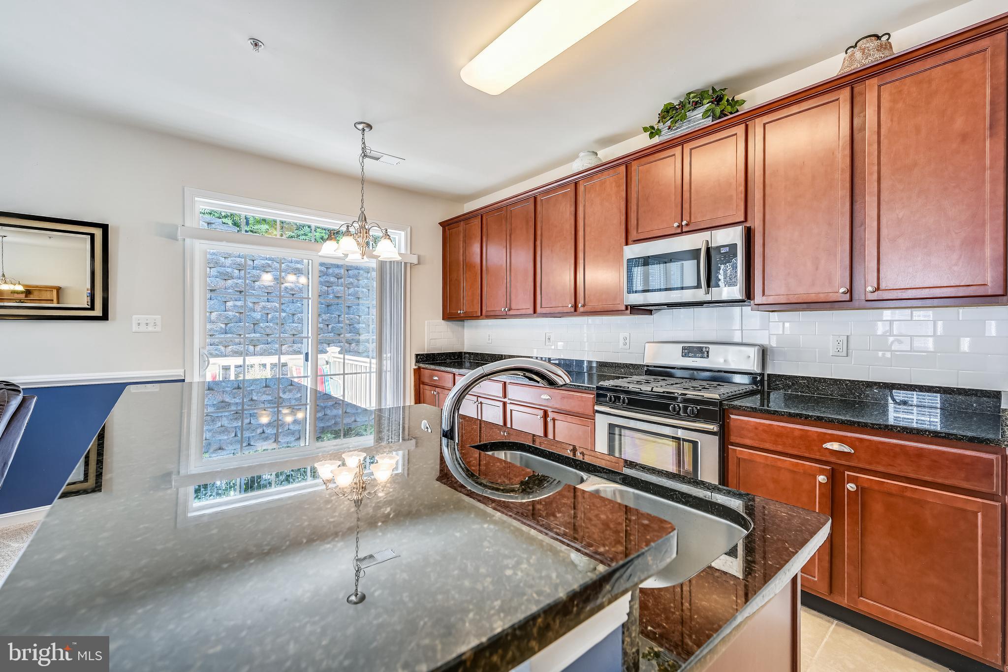 105 Jacobia Drive, Unit E4 Pasadena, MD 21122 - Photo 12 of 36 Bright kitchen