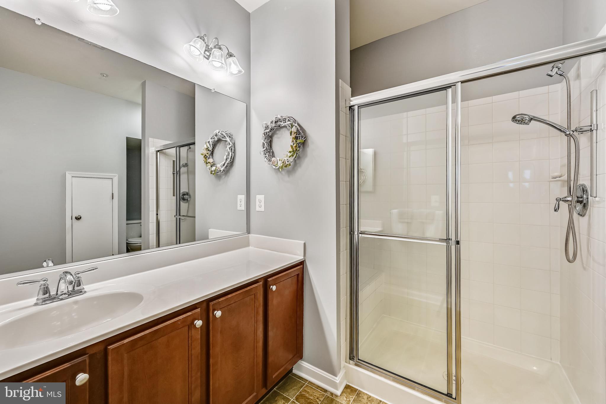 105 Jacobia Drive, Unit E4 Pasadena, MD 21122 - Photo 17 of 36 Master bath