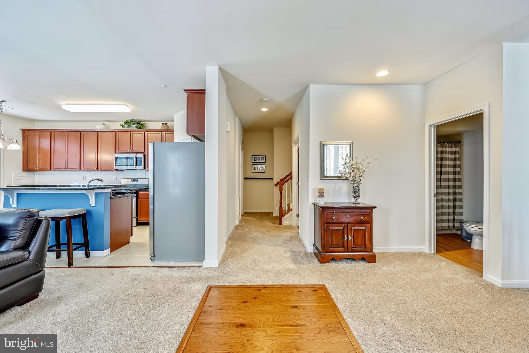 105 Jacobia Drive, Unit E4 Pasadena, MD 21122 - Photo 18 of 36 Hallway leads to main level Master and upper level