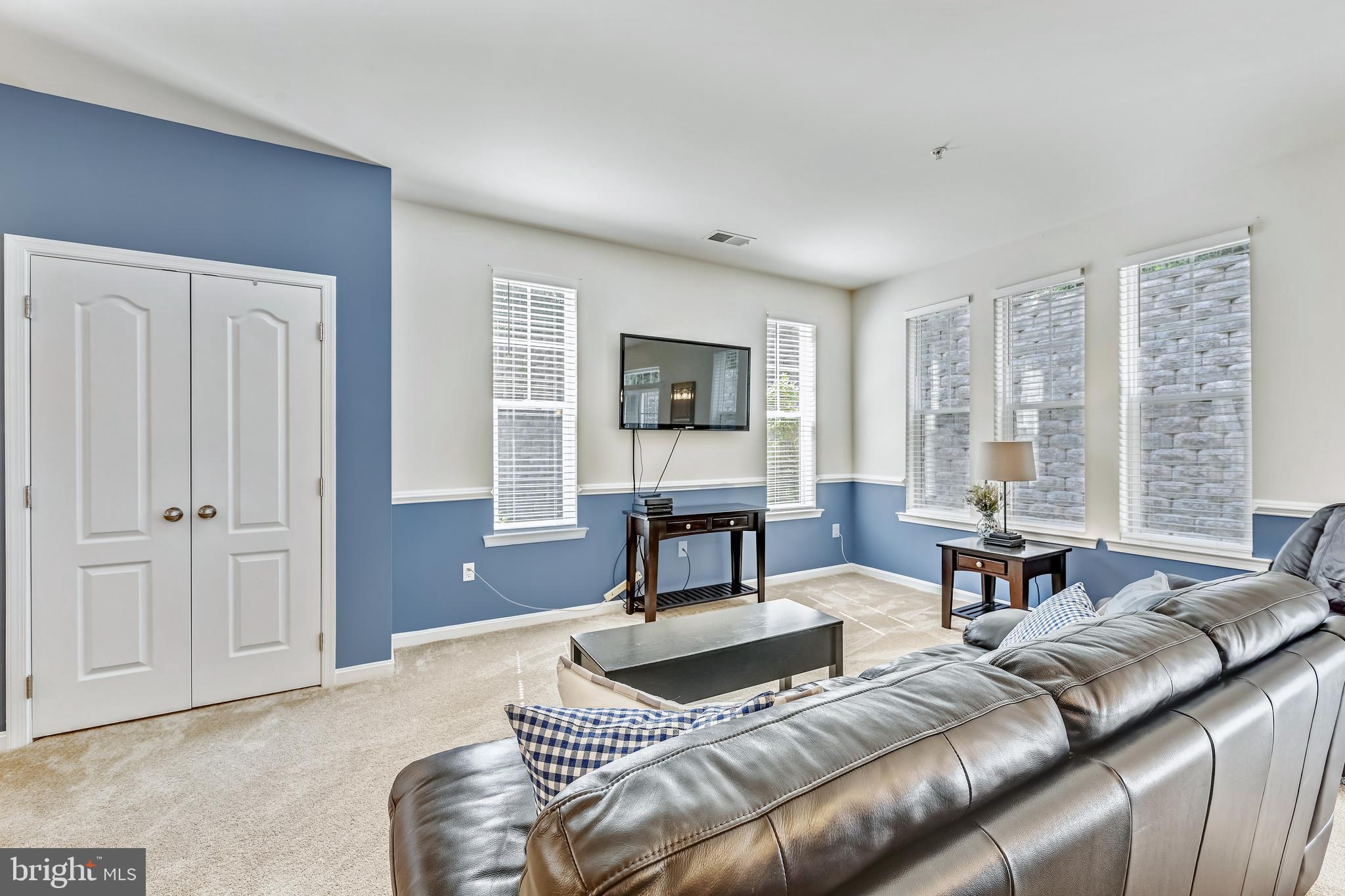 105 Jacobia Drive, Unit E4 Pasadena, MD 21122 - Photo 2 of 36 Entry closet for added storage.