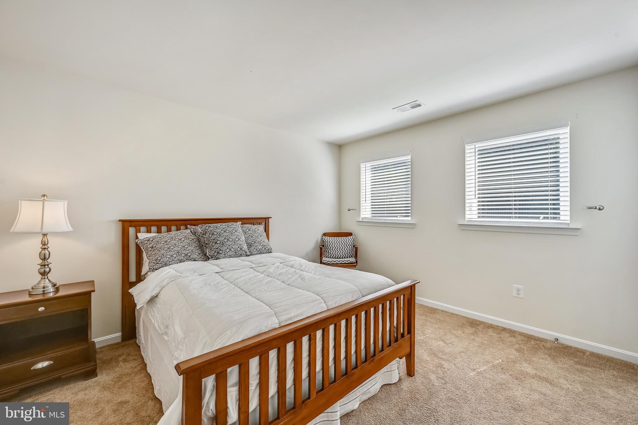 105 Jacobia Drive, Unit E4 Pasadena, MD 21122 - Photo 20 of 36 Upper level bedroom 1