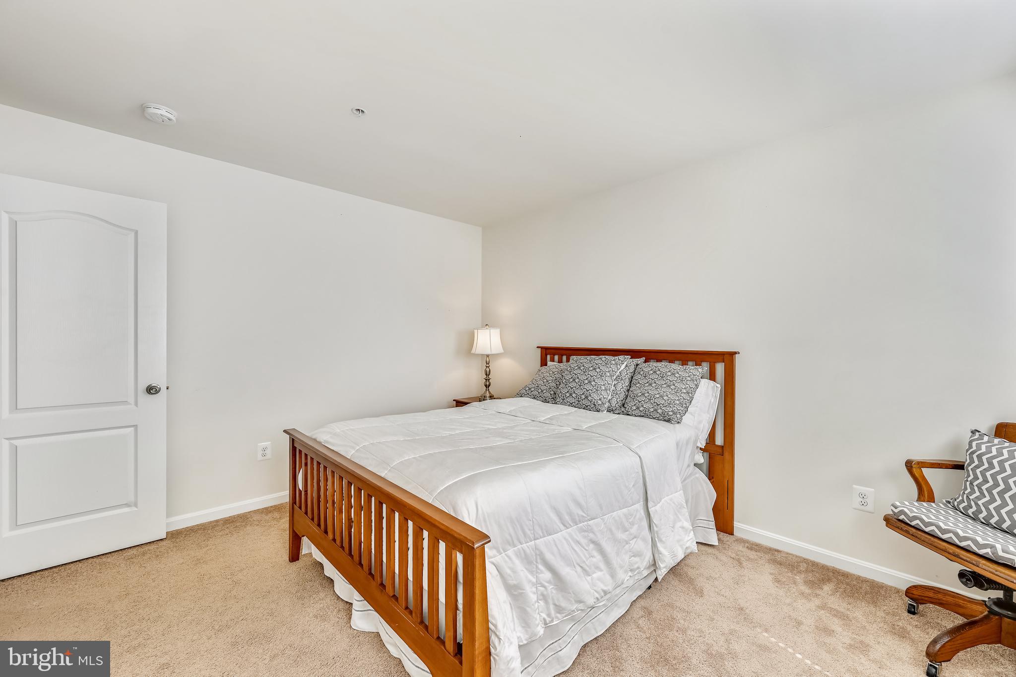 105 Jacobia Drive, Unit E4 Pasadena, MD 21122 - Photo 21 of 36 Upper level bedroom 1