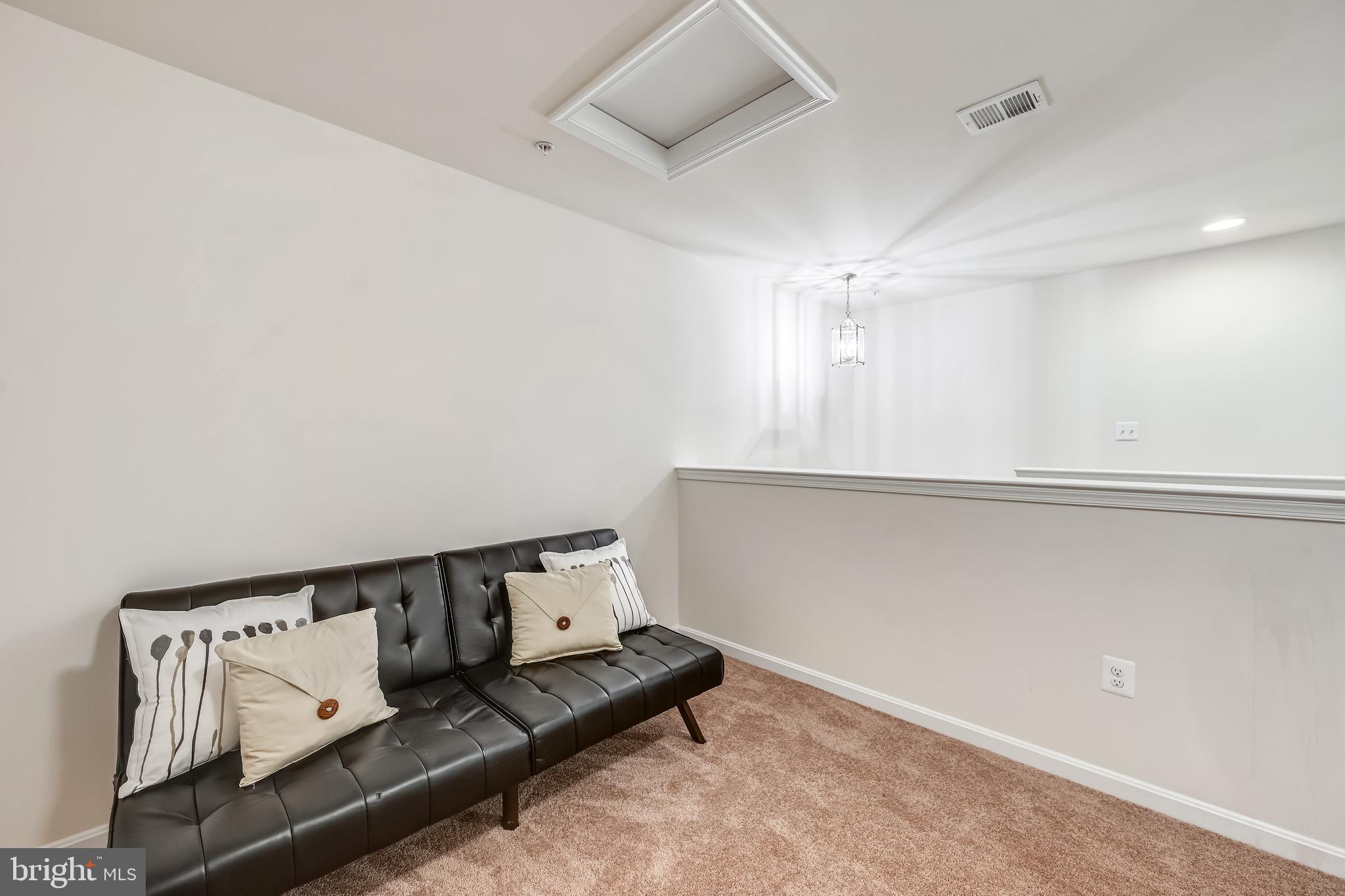 105 Jacobia Drive, Unit E4 Pasadena, MD 21122 - Photo 29 of 36 Upper level loft area.