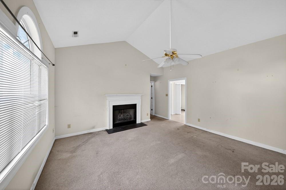 2205 Old Sparta Road Rocky Mount, NC 27804 - Photo 10 of 25 a view of empty room with a fireplace